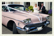 1958 Pink Cadillac with White roof