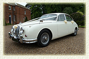 1961 MK II Jaguar in Old English White with spoked wheels